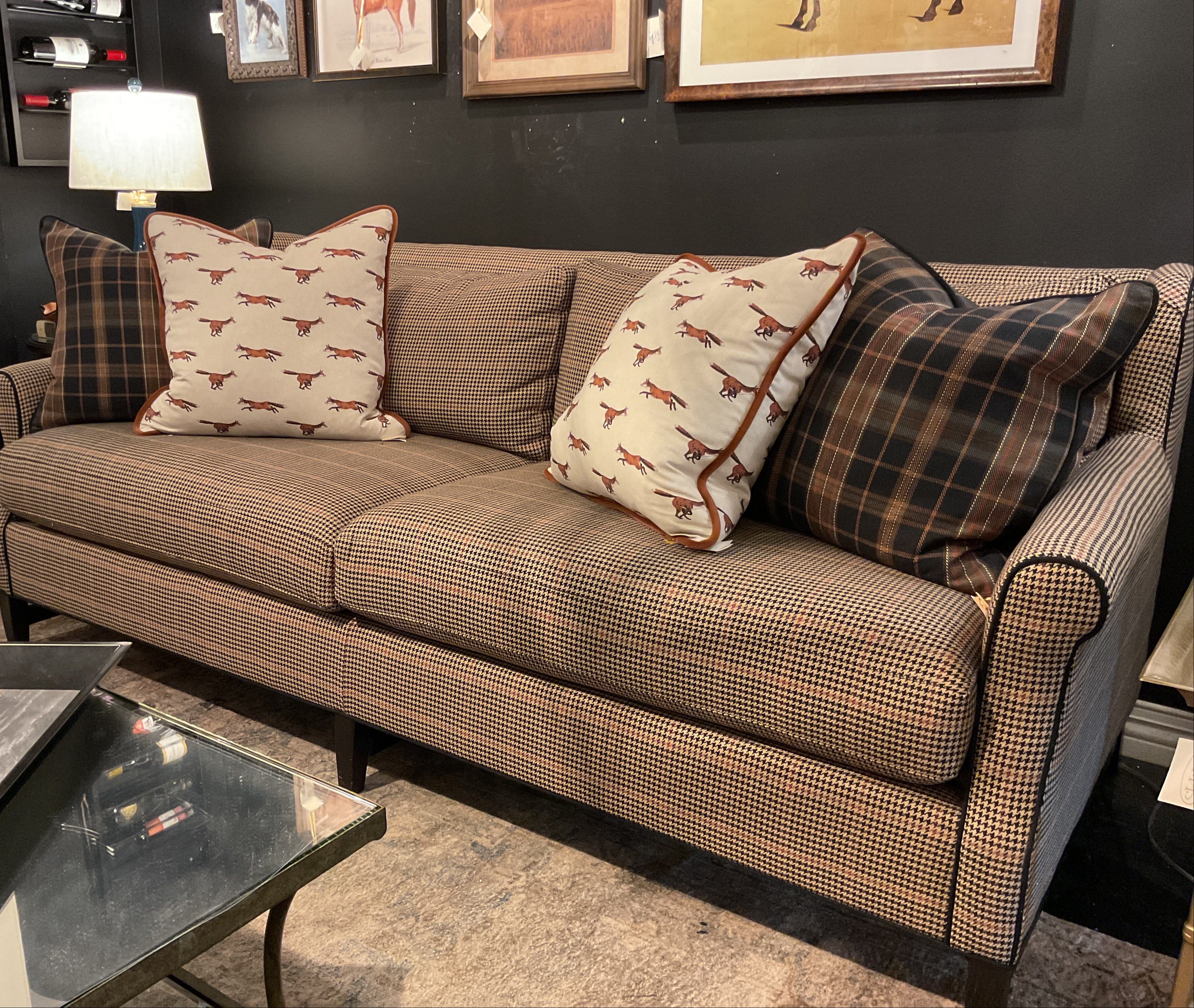 Sofa in Carriage club java cotton red black cream plaid houndstooth fabric by the yard from nell hill's and Pillow shams in Foxtrot toile and Tobacco Twill Cigar brown and black plaid fabric by the yard