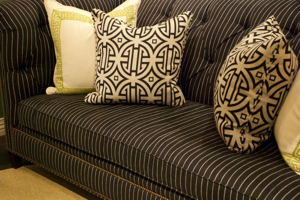This beaded pinstripe sofa a sophisticated canvas for interesting pillows. 