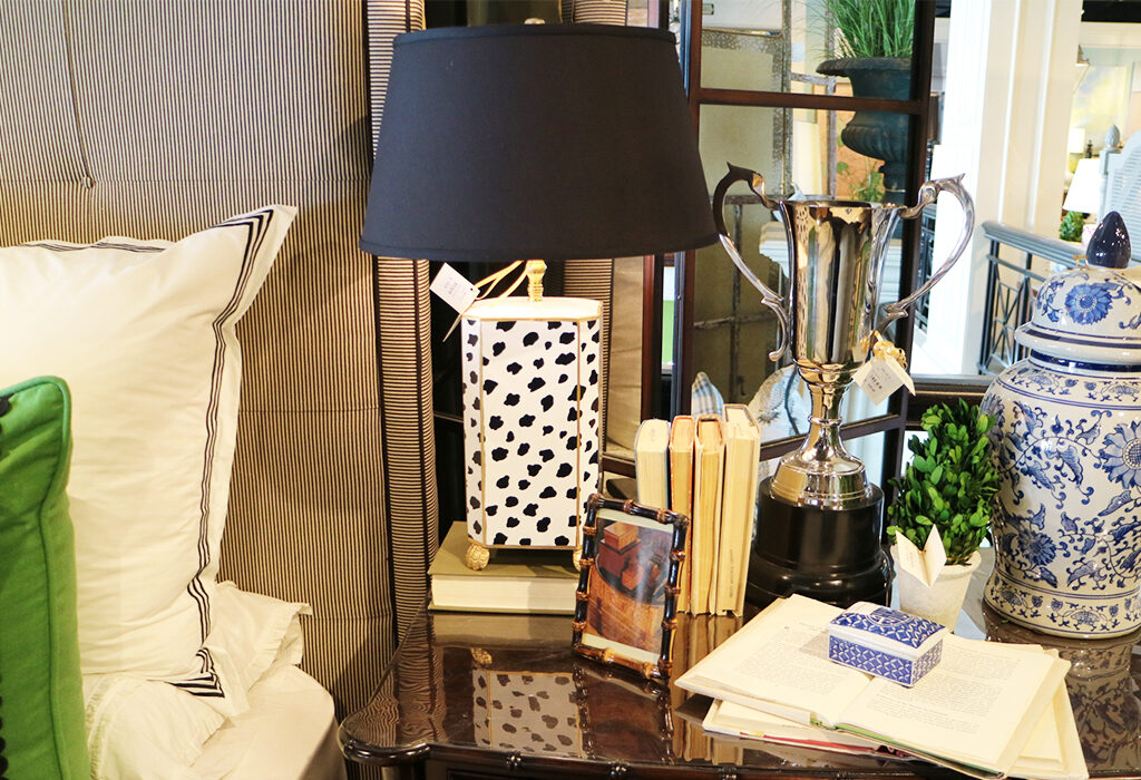 Patterned lamps bring a fun and powerful energy to any space.  Utilizing a lamp with a black shade is a nice venture from the classic white and really stands out.