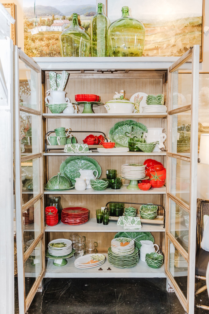 cabbage ware on a shelf with other dishes